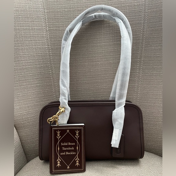 Coach Handbags - Coach Swing Zip Bag in colour silver/maple NWT